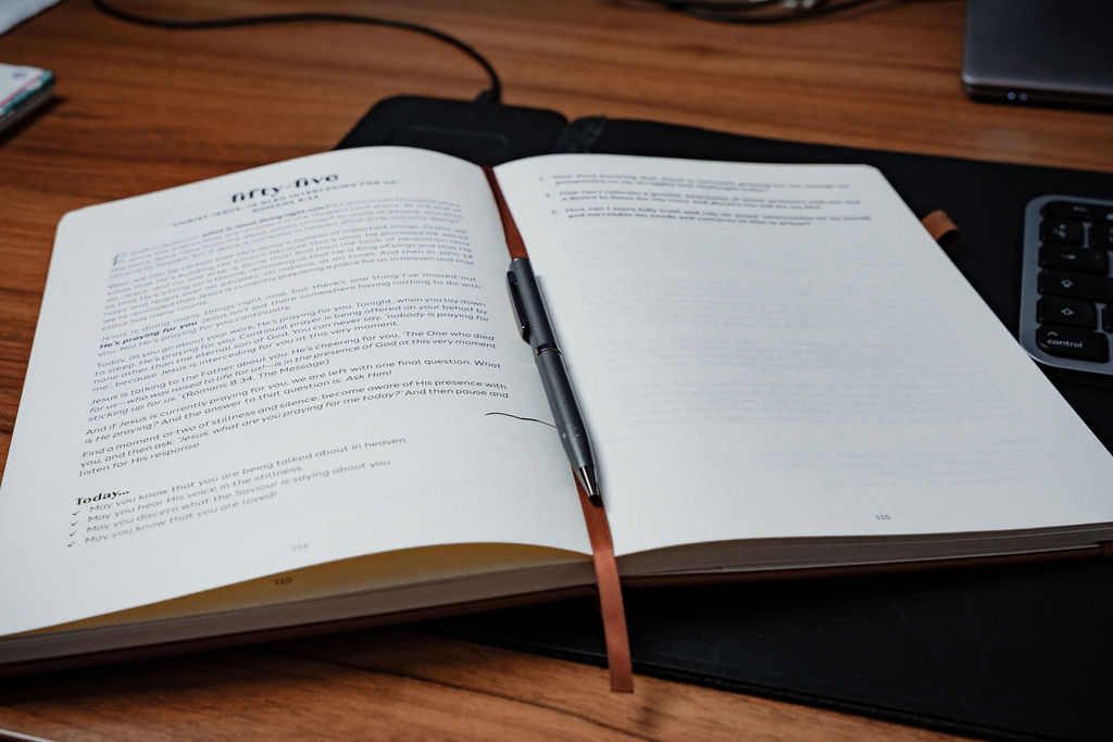 Christian journal open for prayer and devotional reflection